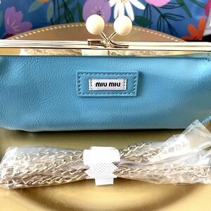 Miu Miu Sky Blue Clutch with Gold Accents